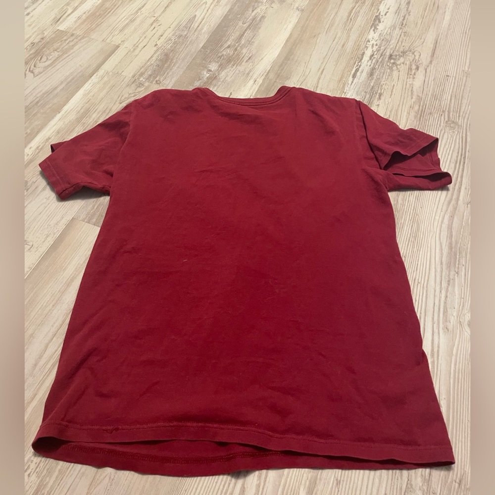 Size; J America, size small, color a moroon red!